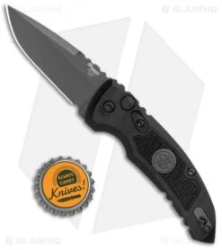 Hogue Knives A01 Microswitch Auto Knife Sig Medallion Drop Point (2.6" Black) -Sharp Knife World Hogue A01 Microswitch Wharncliffe Black Sig Medallion Black 16112 BHQ 100451 jr bottlecap